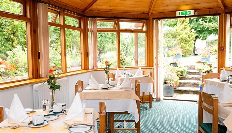 Winter Dene's stunning breakfast room next to the gardens